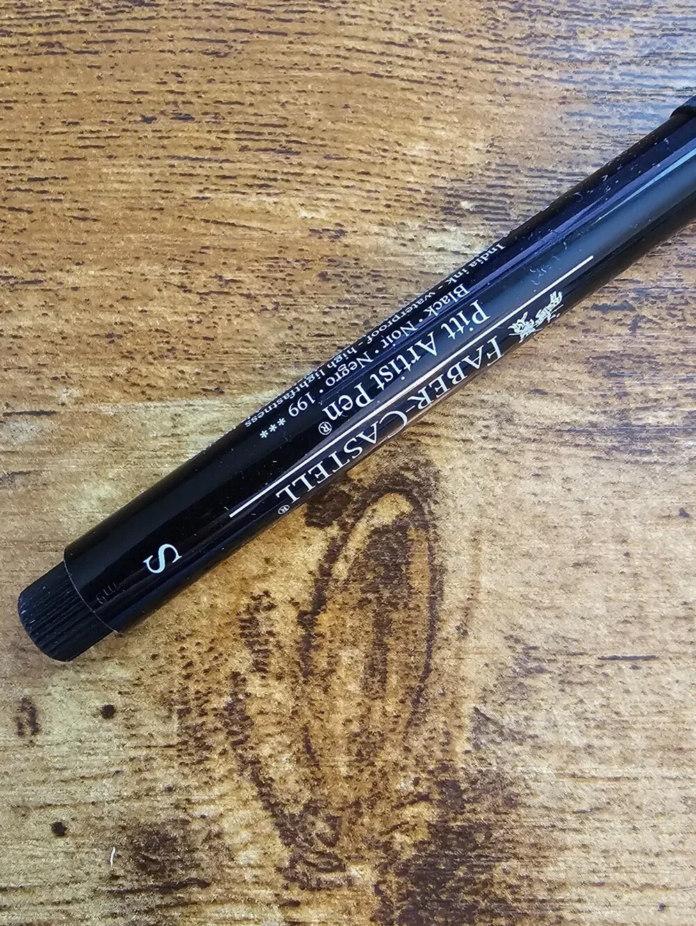 Faber-Castell Pitt Artist Pen with black India ink and a Superfine (S) tip